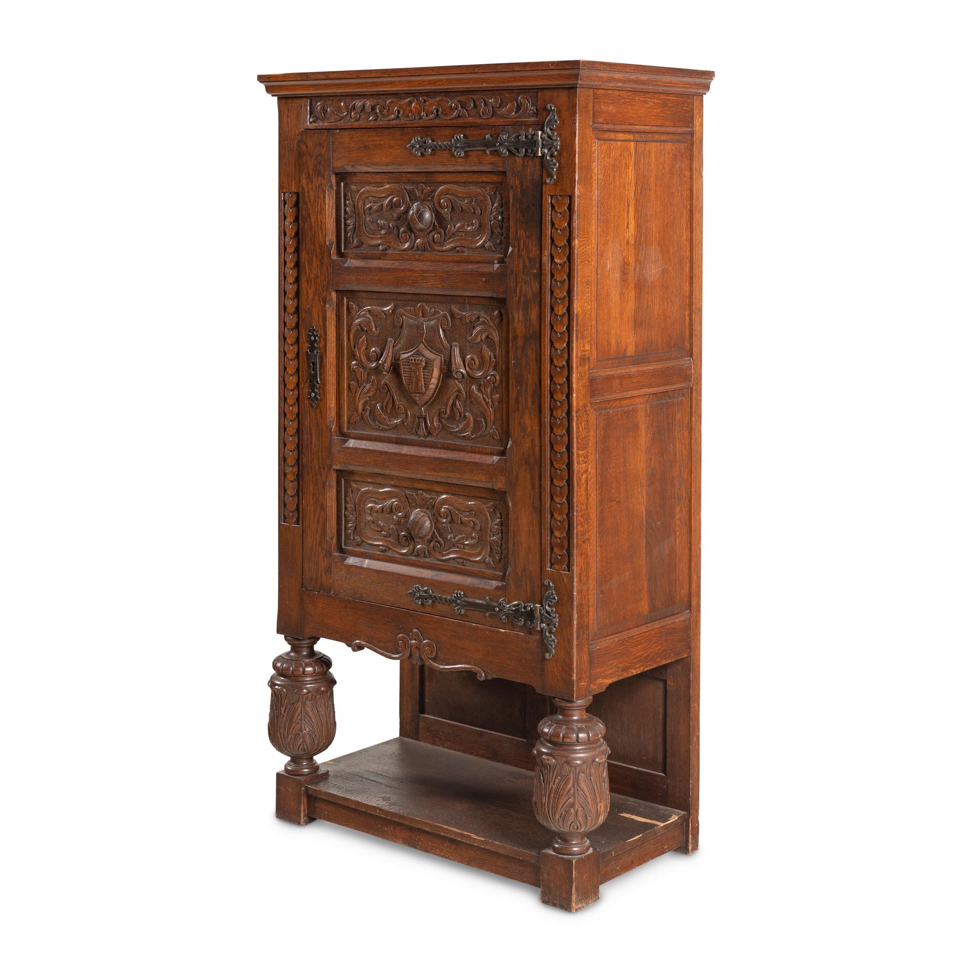 A Baroque Style Carved Oak Cabinet