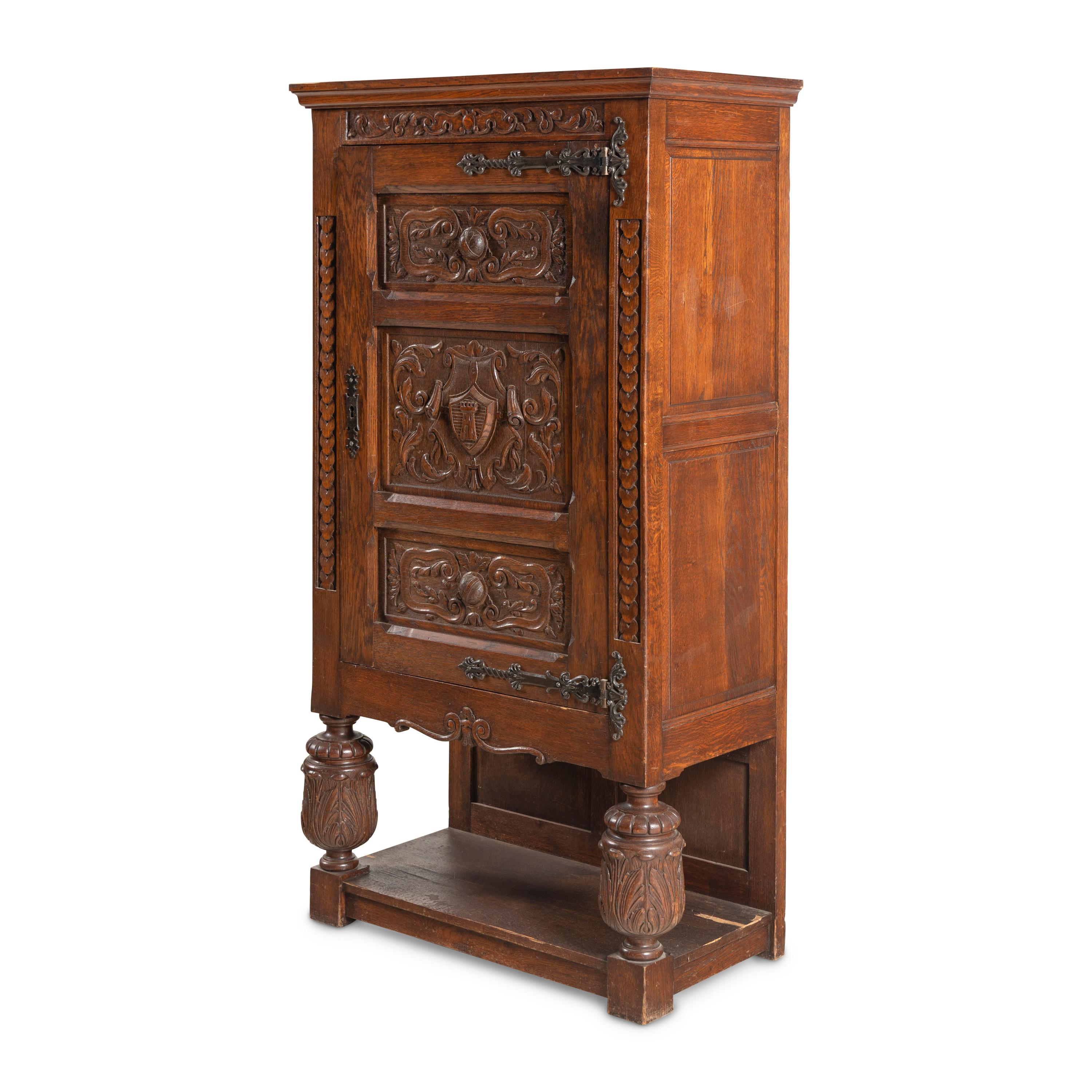 A Baroque Style Carved Oak Cabinet