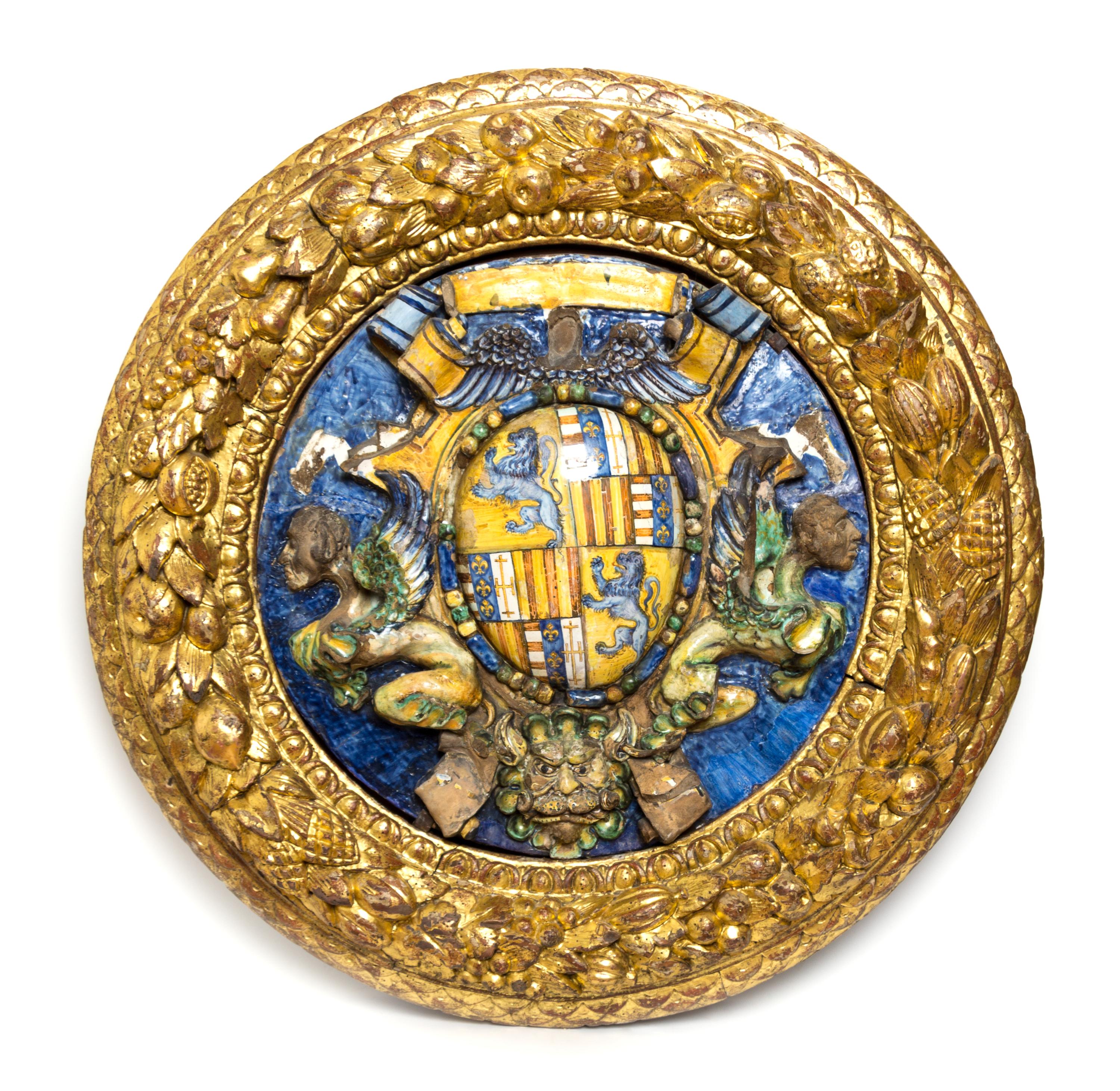 A French Glazed Ceramic Coat of Arms Diameter of frame 33 inches. — 17TH/18TH CENTURY