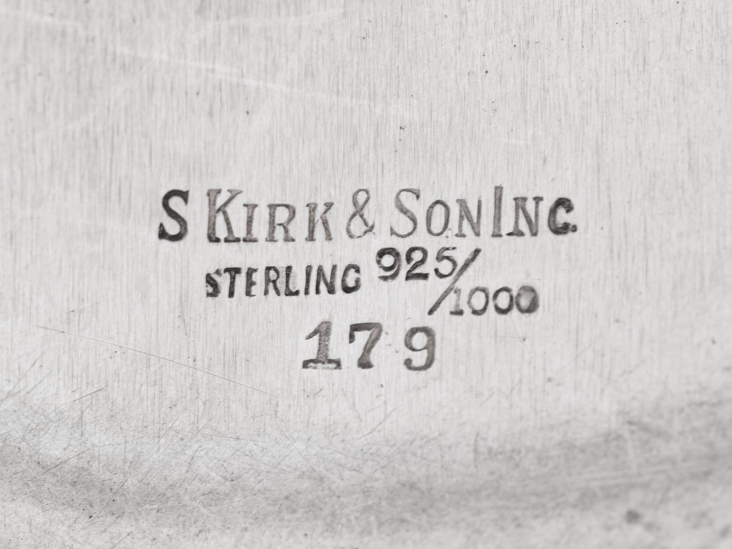 A Group of Four S. Kirk and Son Repousse Silver Table Articles