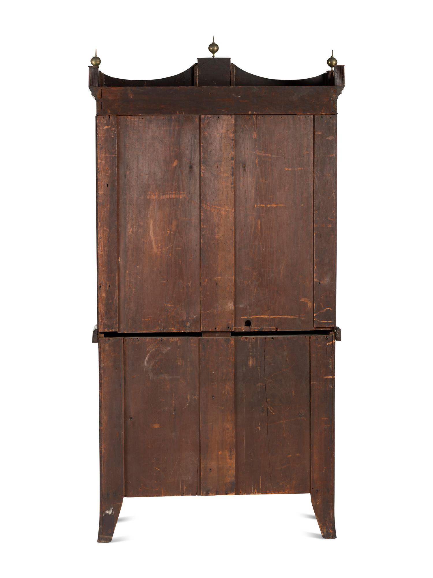 A Federal Inlaid Mahogany Lady's Writing Desk-and-Bookcase