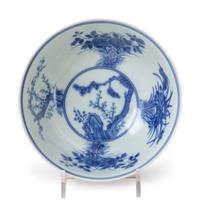 A Ruby Sgraffito Ground Famille Rose and Underglaze Blue Porcelain Bowl