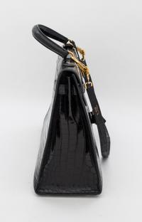 An Hermes 32cm Black Porosus Crocodile Kelly Bag, 12" x 9.5" x 4.5".