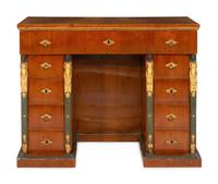A Continental Empire Style Painted and Parcel-Gilt Mahogany-Veneered Kneehole Desk