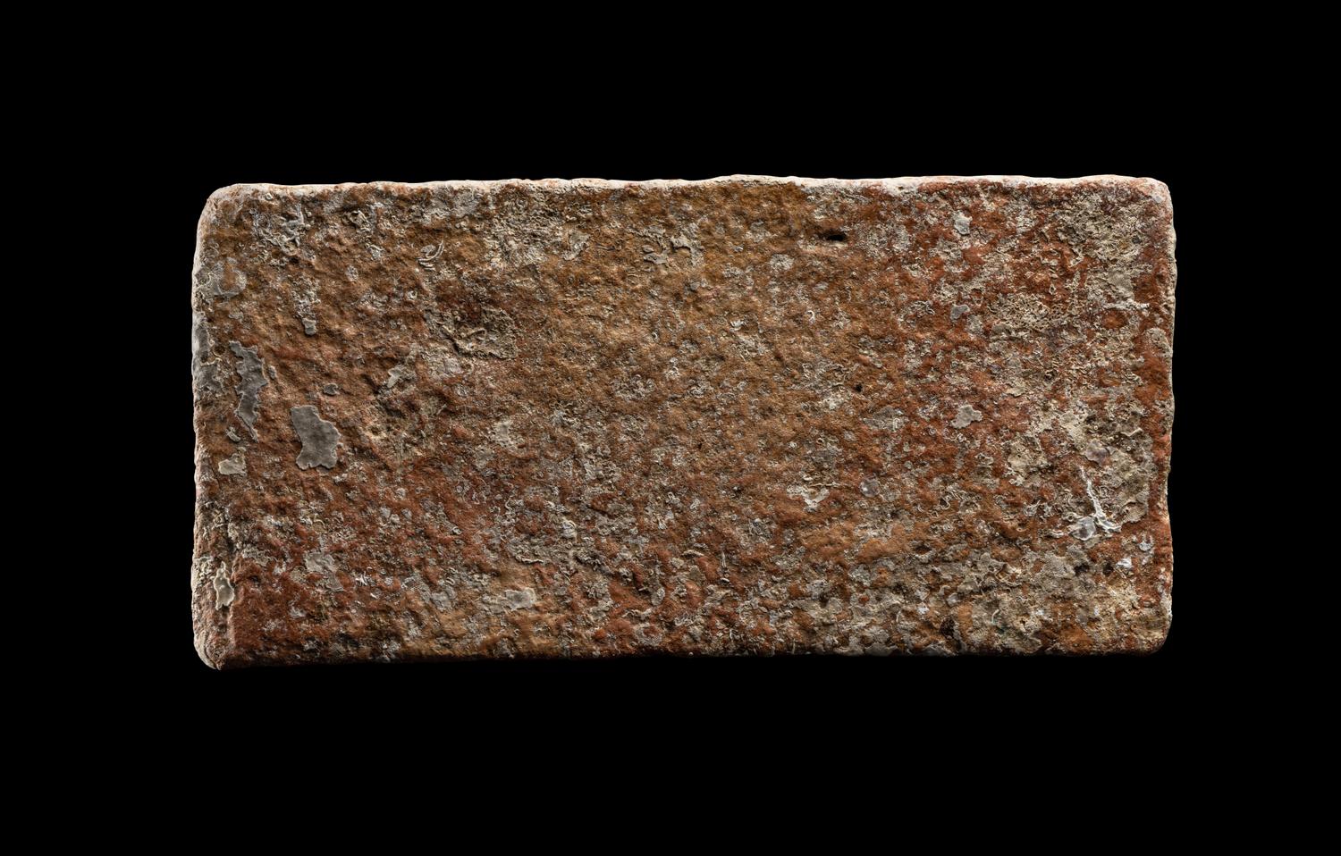 A Roman Ceramic Brick Stamped LXIII