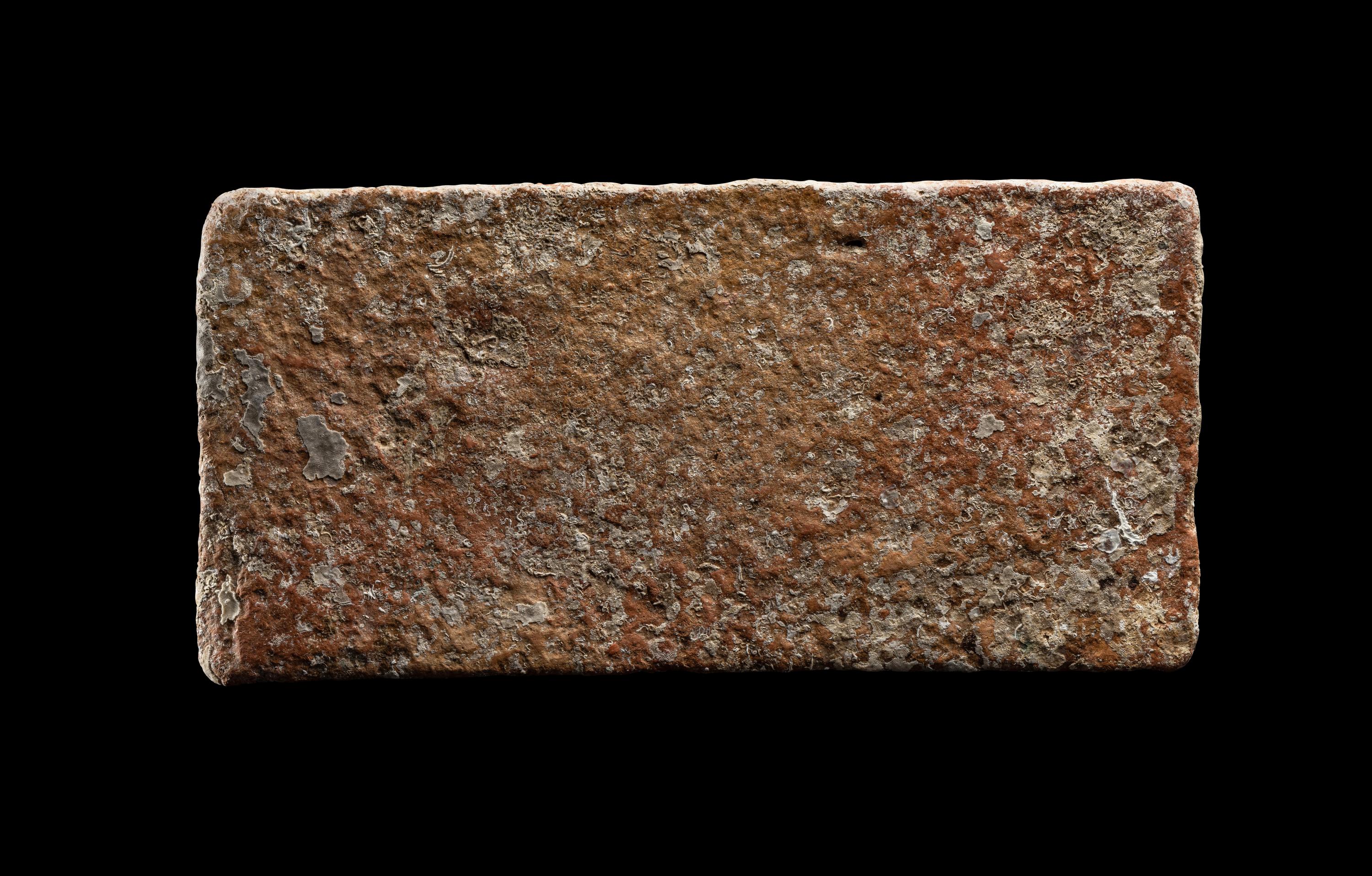 A Roman Ceramic Brick Stamped LXIII