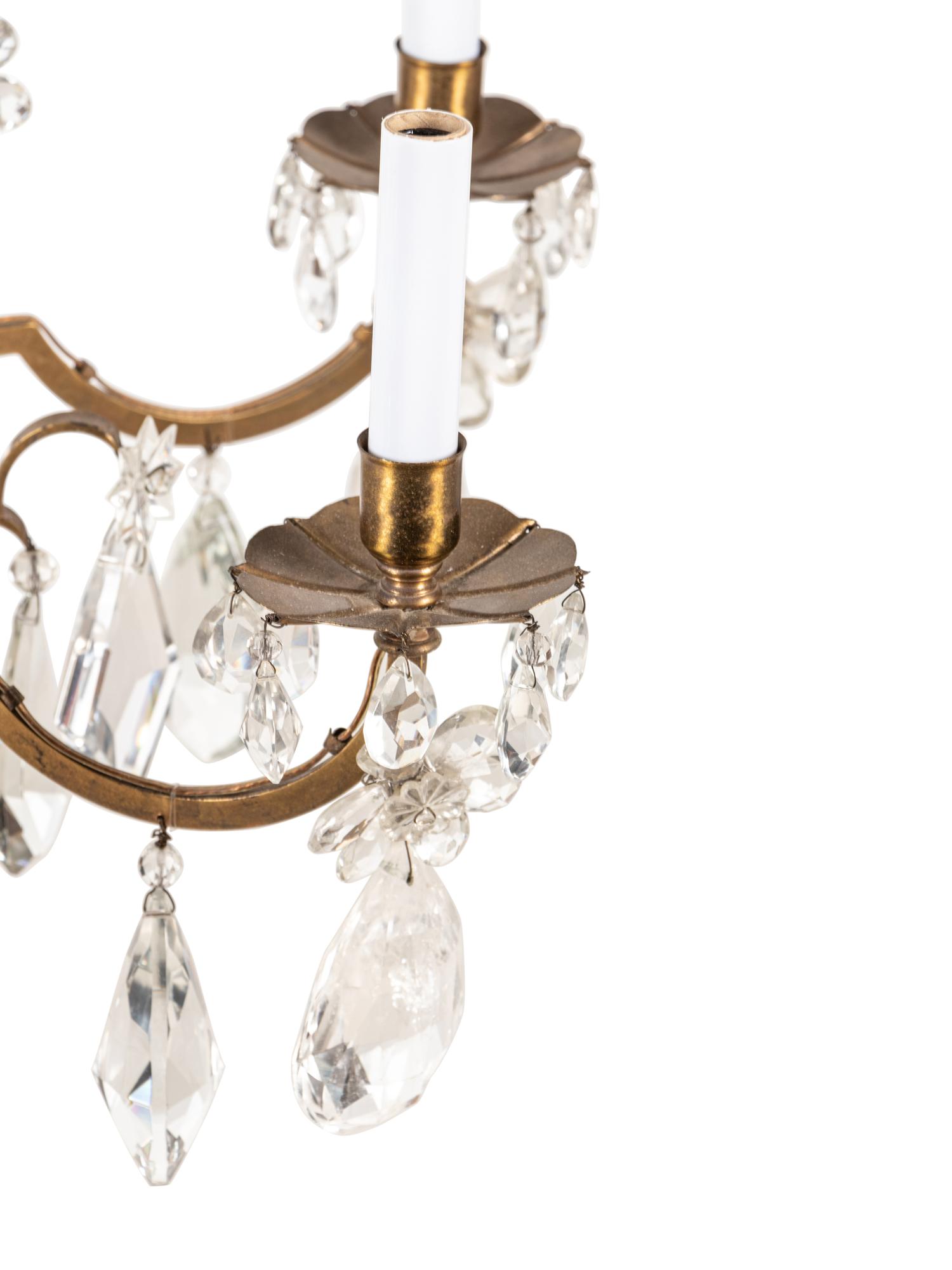 A French Gilt Bronze and Rock Crystal Six-Light Chandelier