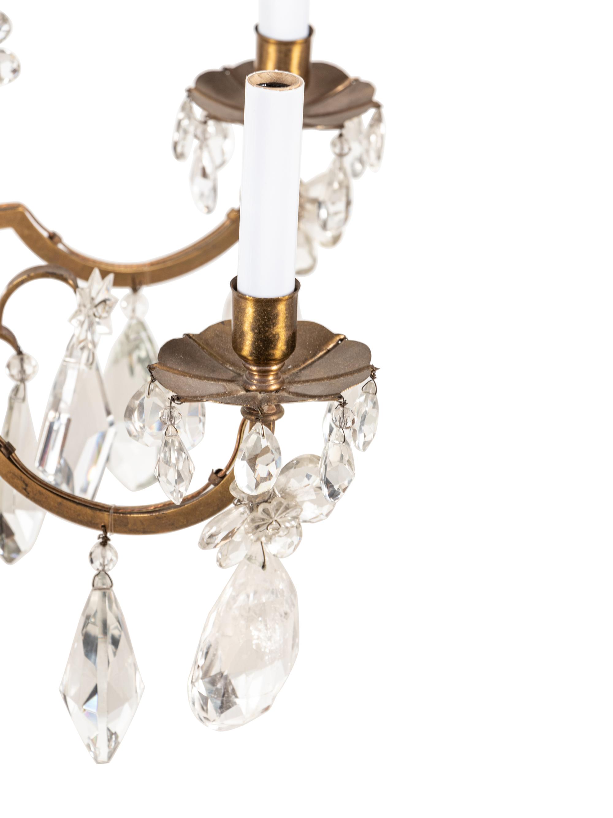 A French Gilt Bronze and Rock Crystal Six-Light Chandelier