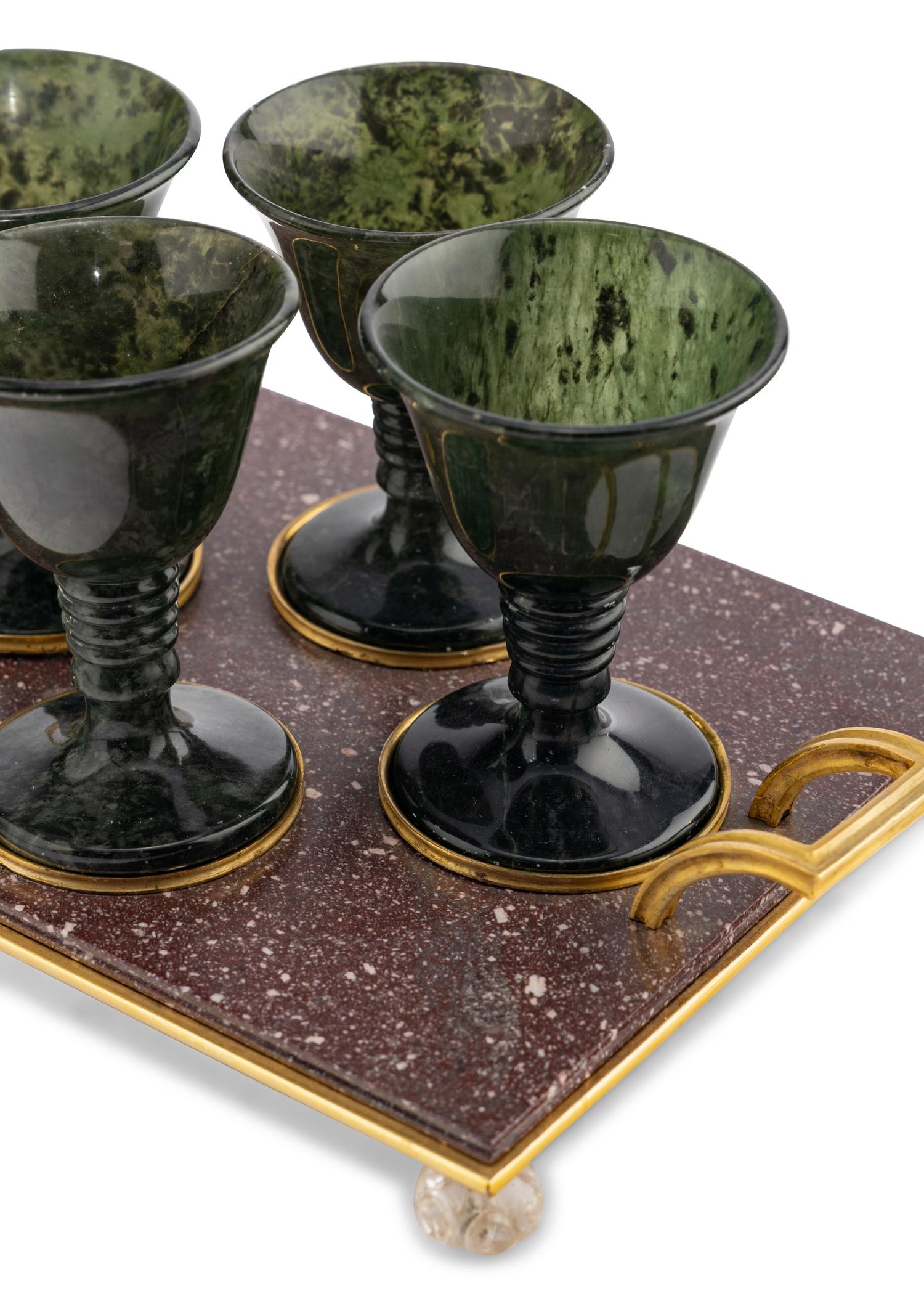 A Gilt Bronze Mounted Porphyry and Spinach Jade Cordial Set