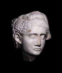 A Roman Marble Relief with a Female Head