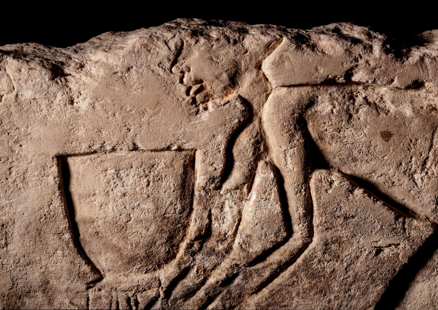 An Egyptian Limestone Relief Fragment