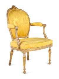 A Matched Pair of George III White-Painted and Parcel-Gilt Armchairs