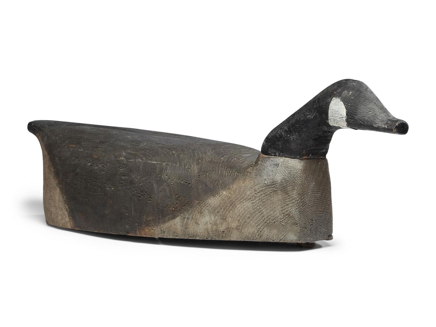 A Carved and Painted White Pine Canadian Goose Decoy