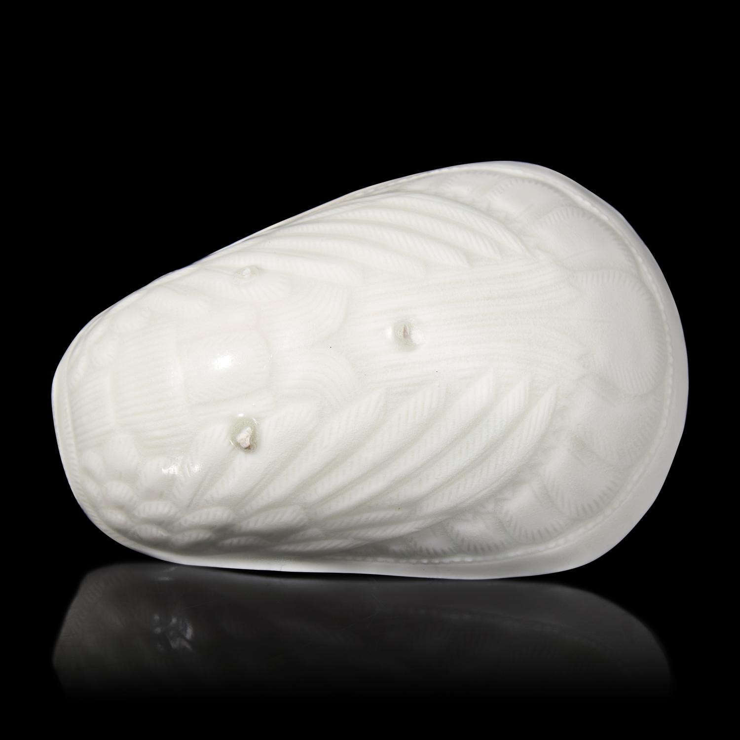 A Chinese Transparent Glazed 'Parrot' Cup, Song Dynasty 宋 白瓷鸚鵡杯