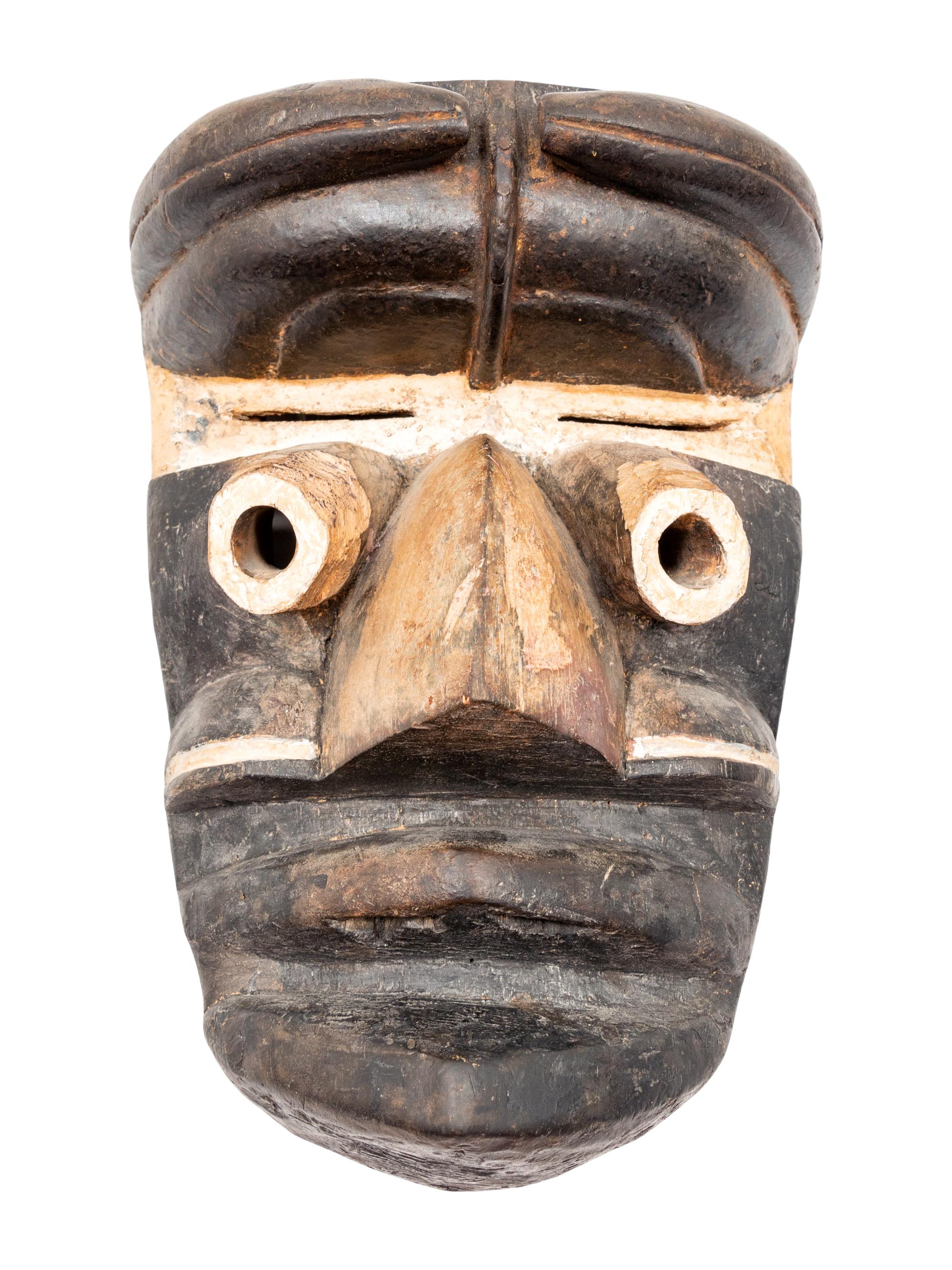 A Group of Carved Wooden African Objects