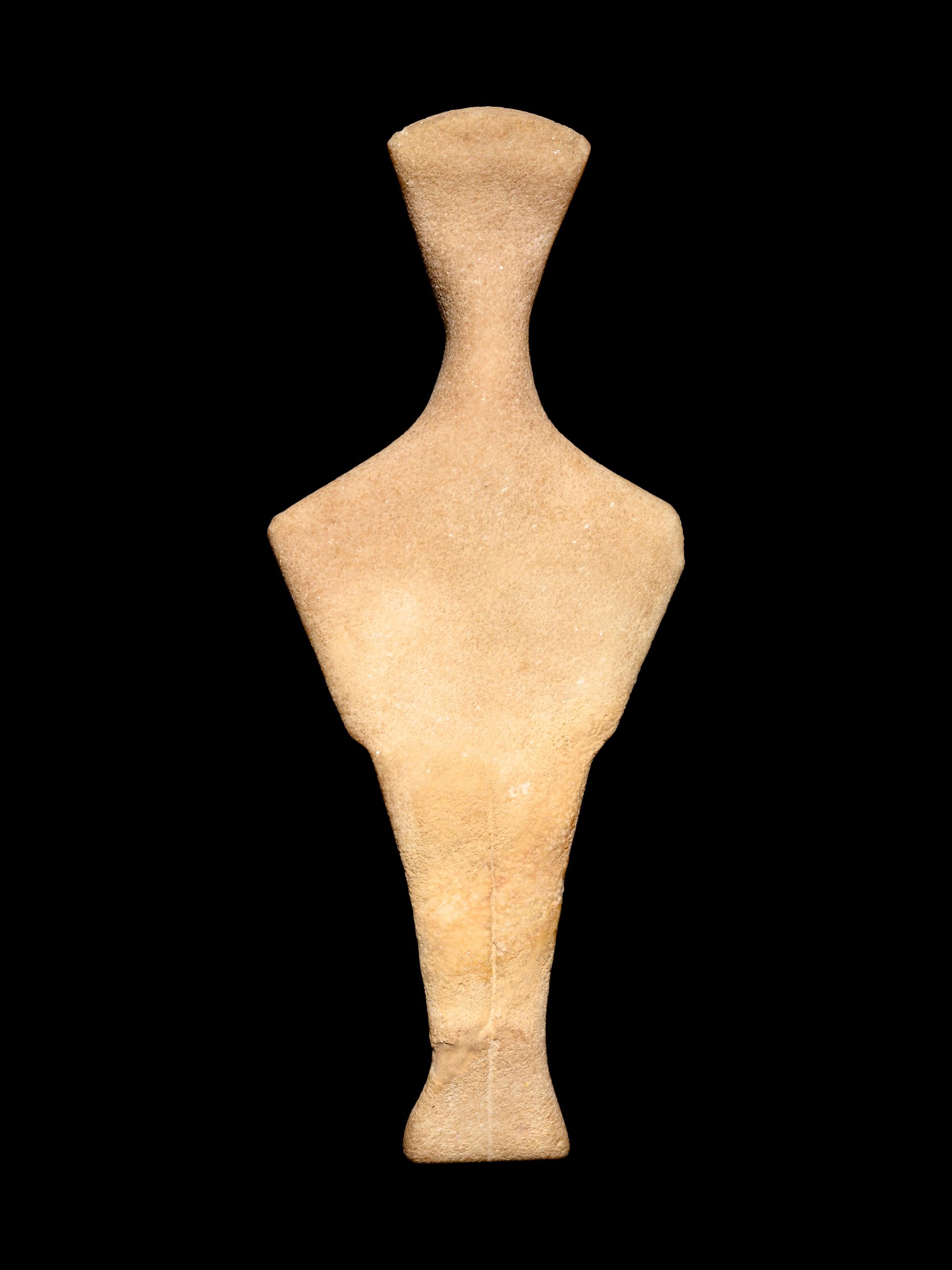A Cycladic Marble Reclining Female Figure