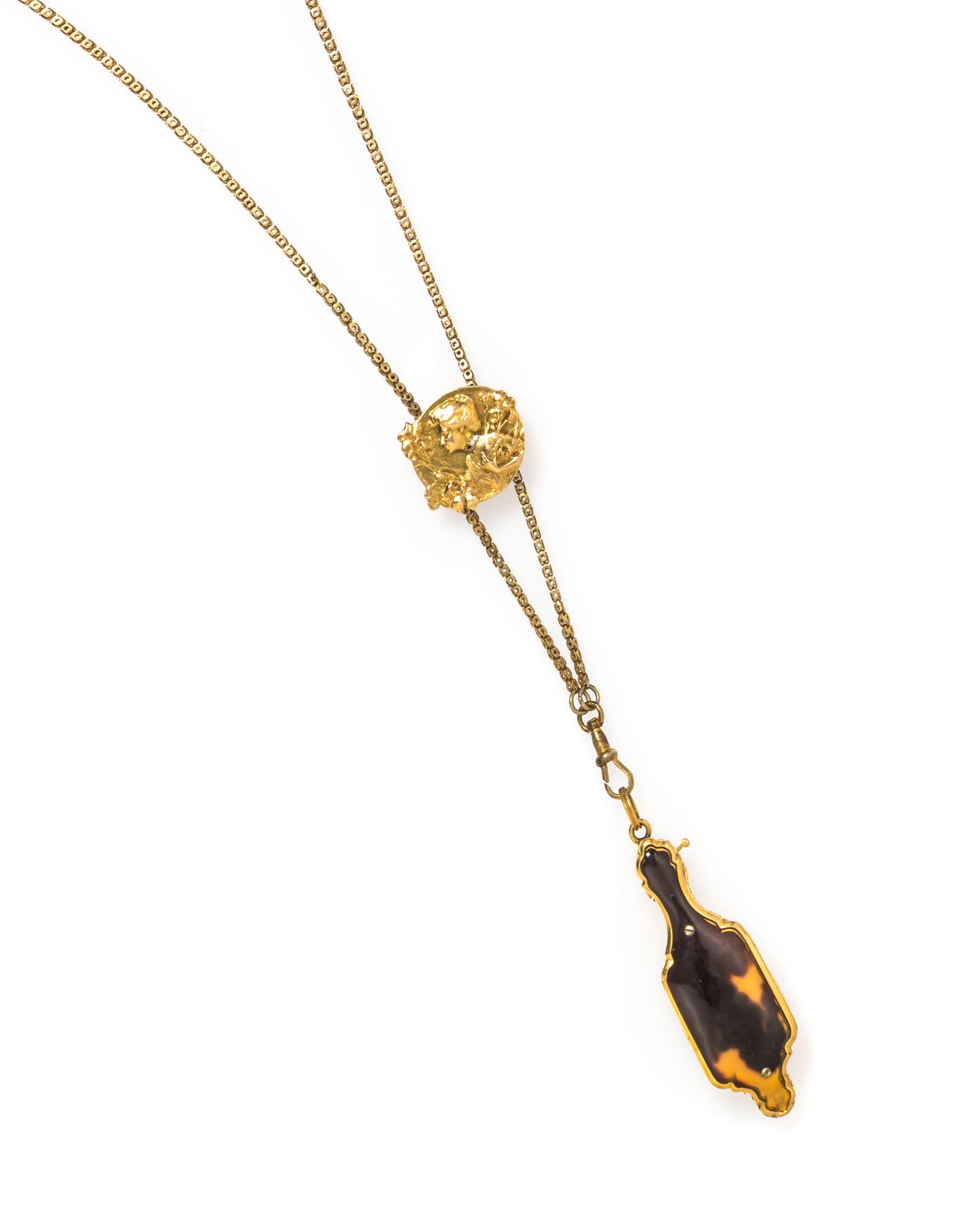 An Antique Tortoiseshell Lorgnette and Gold Slide Pendant, 30.80 dwts.