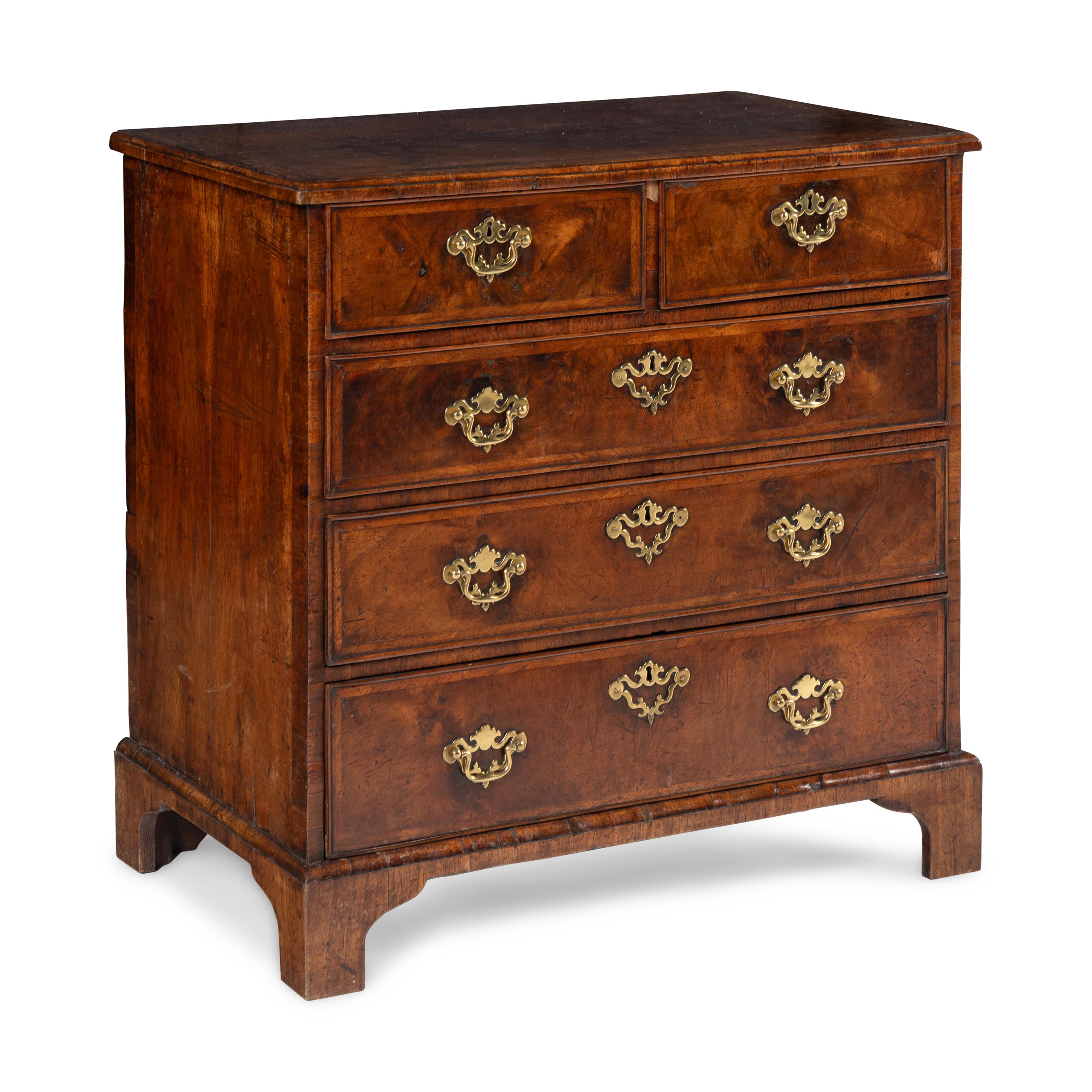 A George III Burl Walnut Chest of Drawers