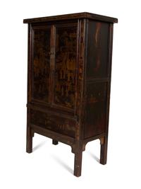 A Chinese Black Lacquer and Parcel Gilt Cabinet