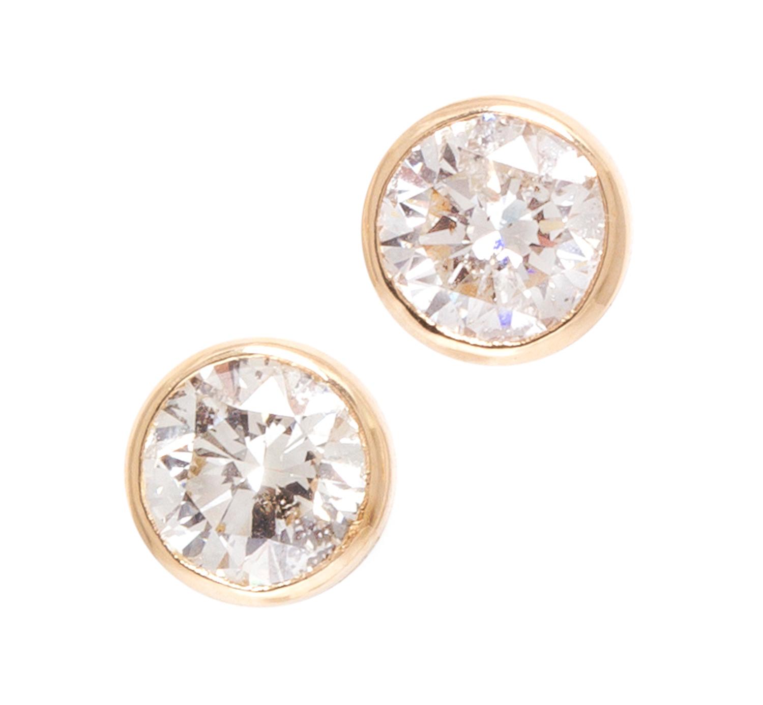 A Pair of Yellow Gold and Diamond Stud Earrings, 1.70 dwts.