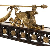 An Empire Style Gilt and Patinated Bronze Fireplace Fender