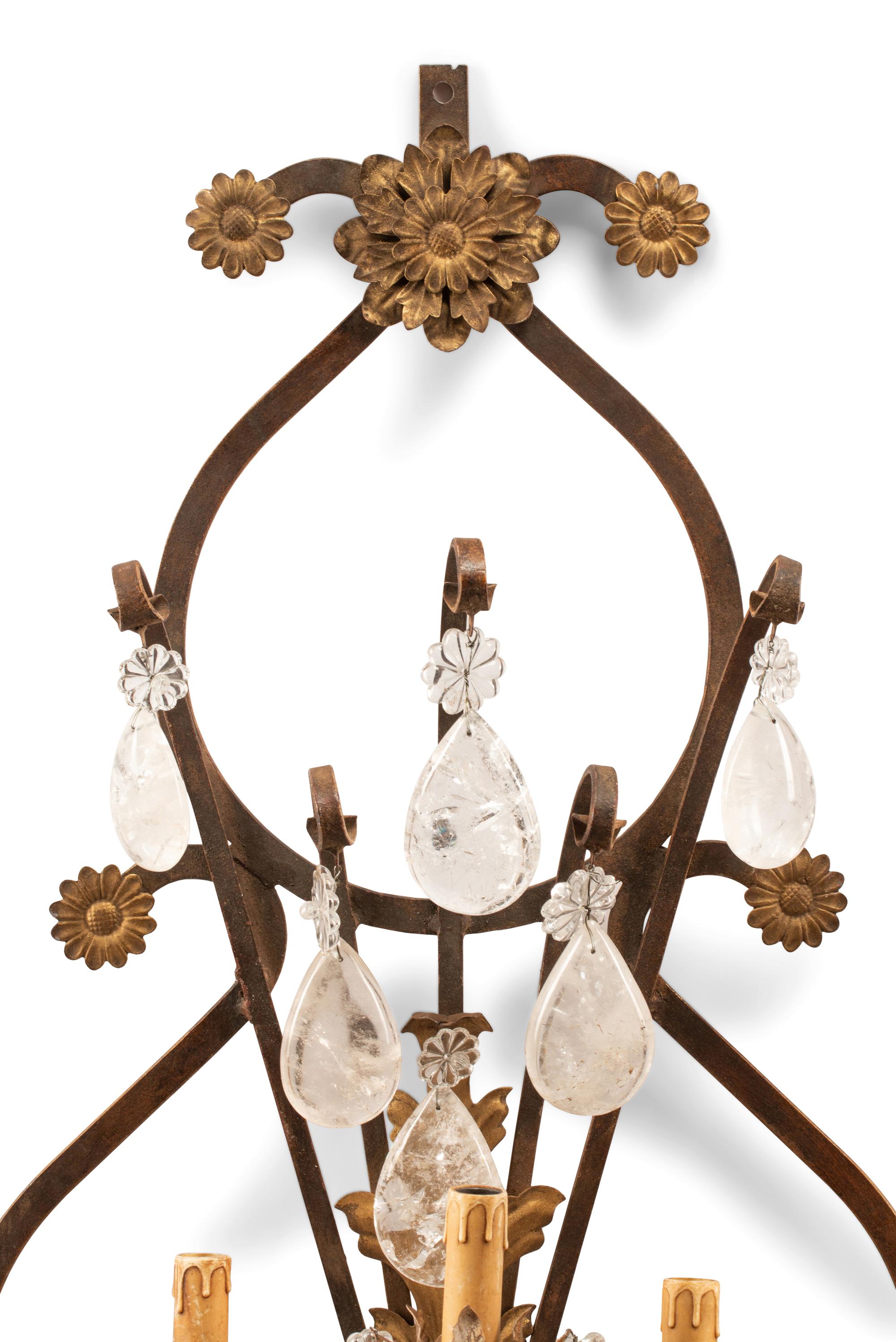 A Pair of Spanish Iron and Rock Crystal Five-Light Sconces