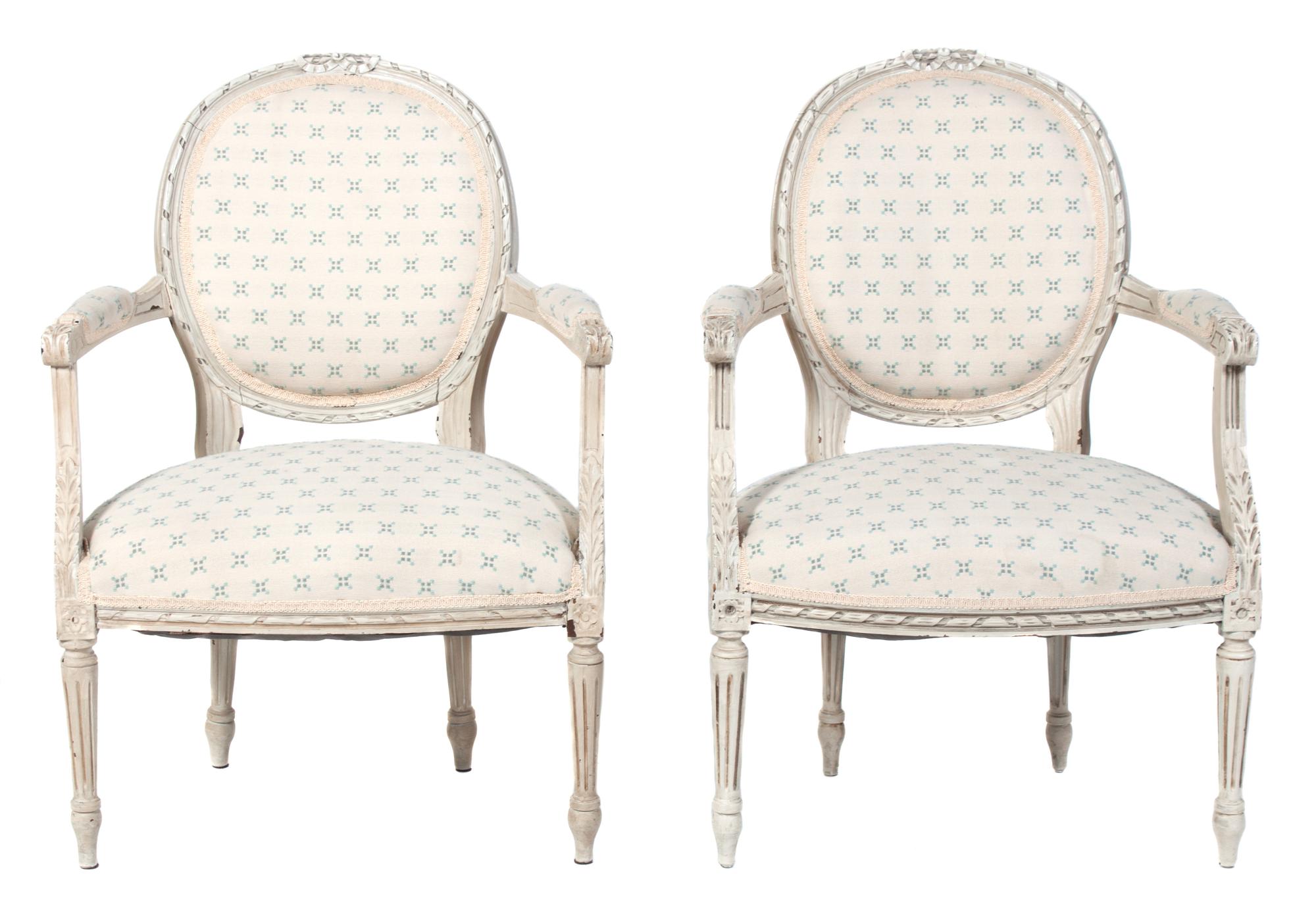 A Pair of Louis XVI Style White Painted Fauteuils Height 35 inches. — 20TH CENTURY