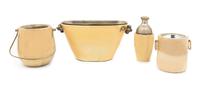 Art Deco, 1930s, a group of four lacquered goatskin bar articles, comprising an ice bucket, shaker and two wine coolers