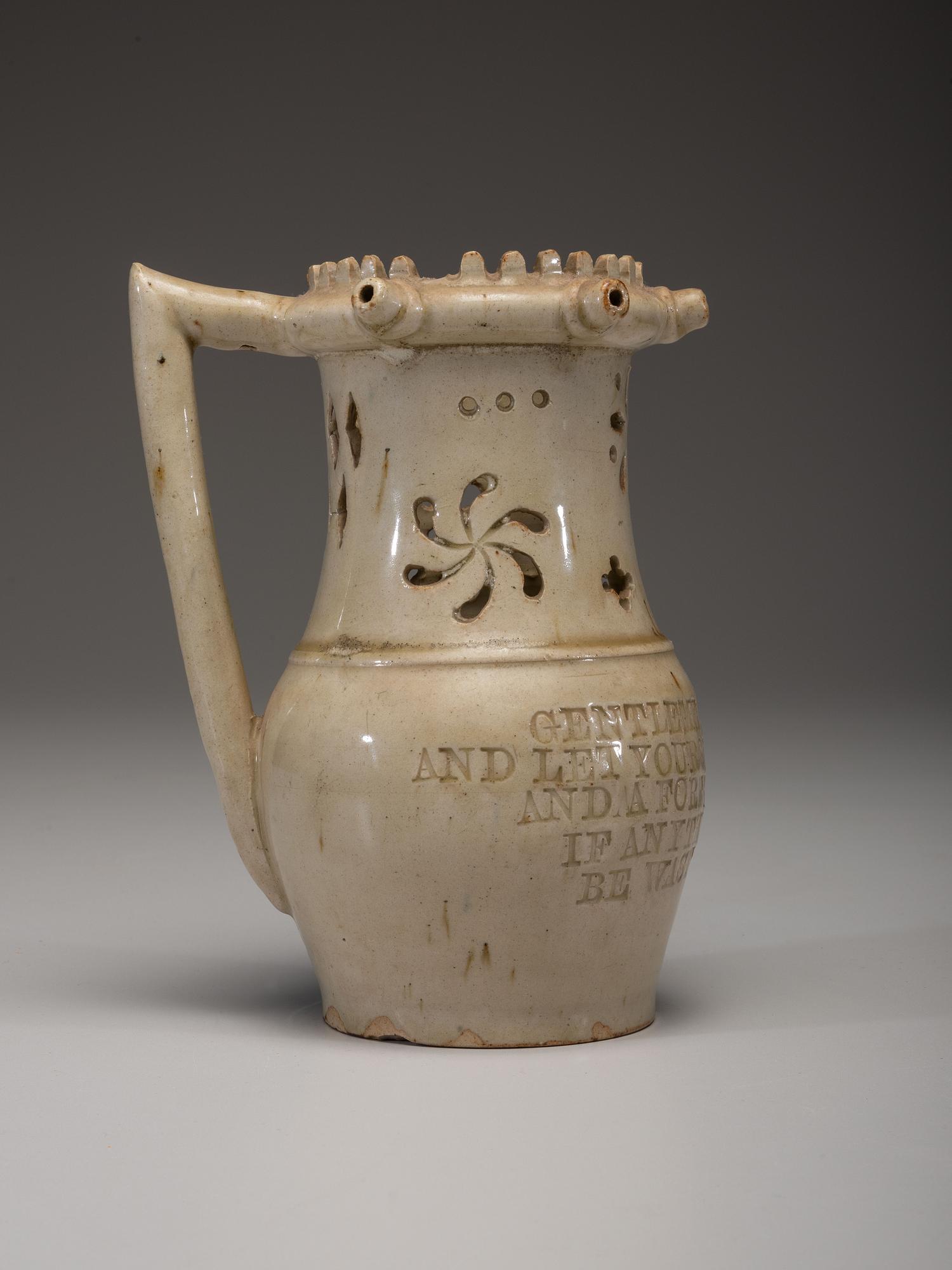 An Incised and Impressed Stoneware Puzzle Jug
