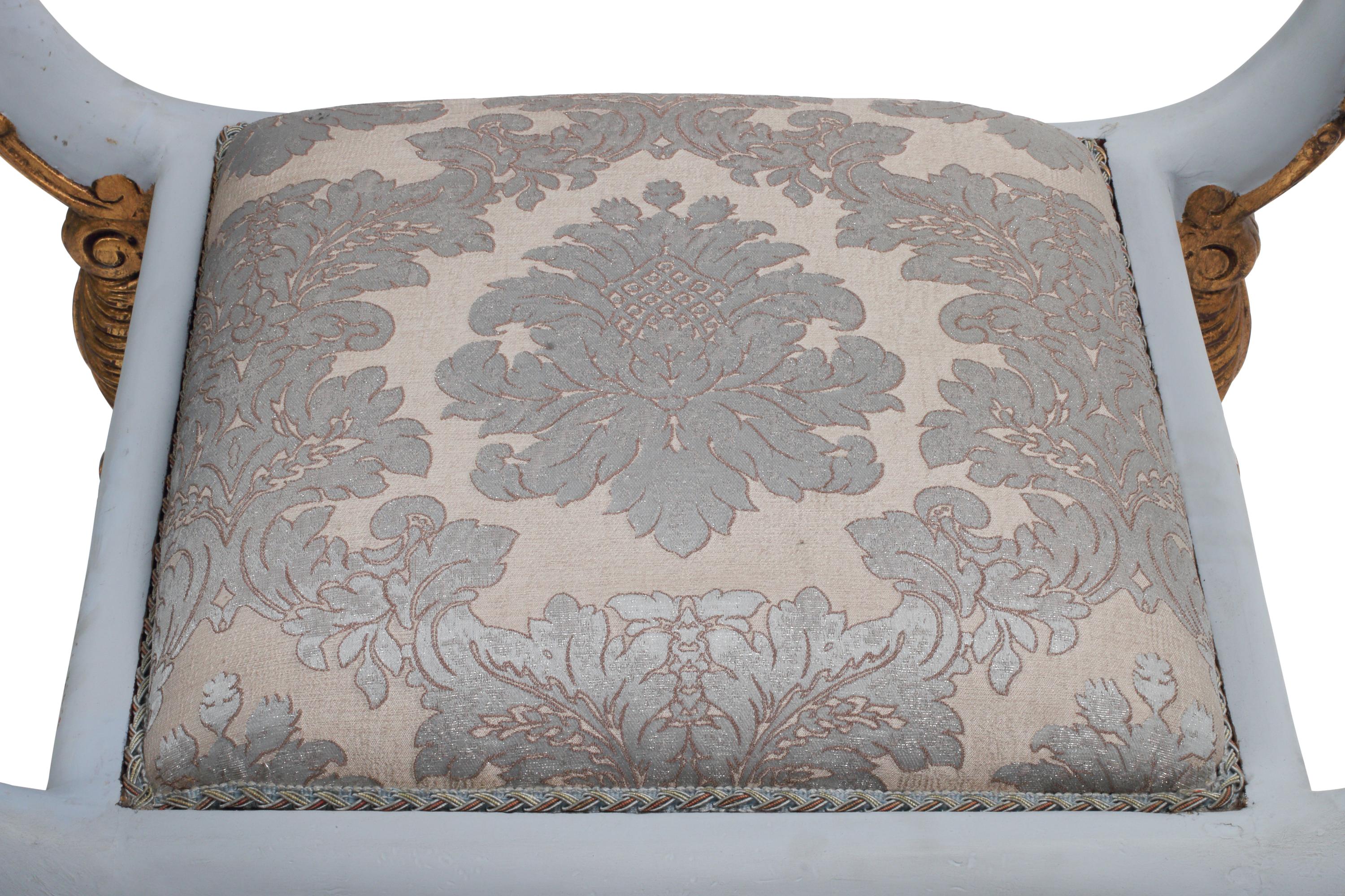 A Pair of Italian Painted and Parcel-Gilt Camel-Motif Benches