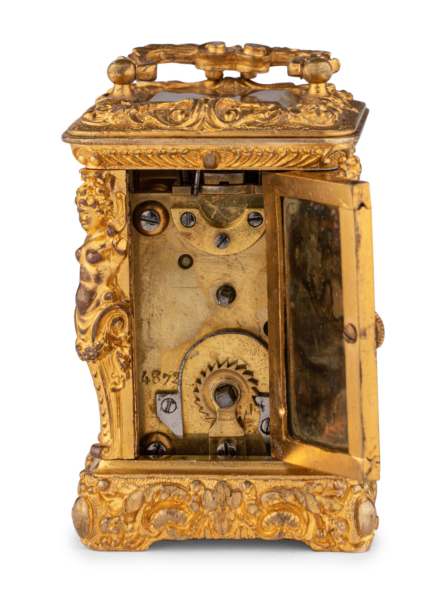 A French Miniature Gilt Bronze Eight-Day Carriage Clock