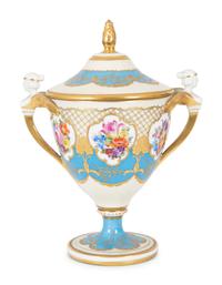 A Fürstenberg Porcelain Gilded Two-Handled Figural Urn