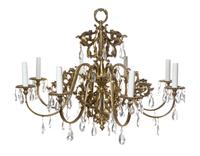 A Louis XV Style Brass Eight-Light Chandelier, Height 22 x diameter 30 inches.