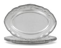 Four English Engraved Silver Lozenge Form Vegetable Dishes