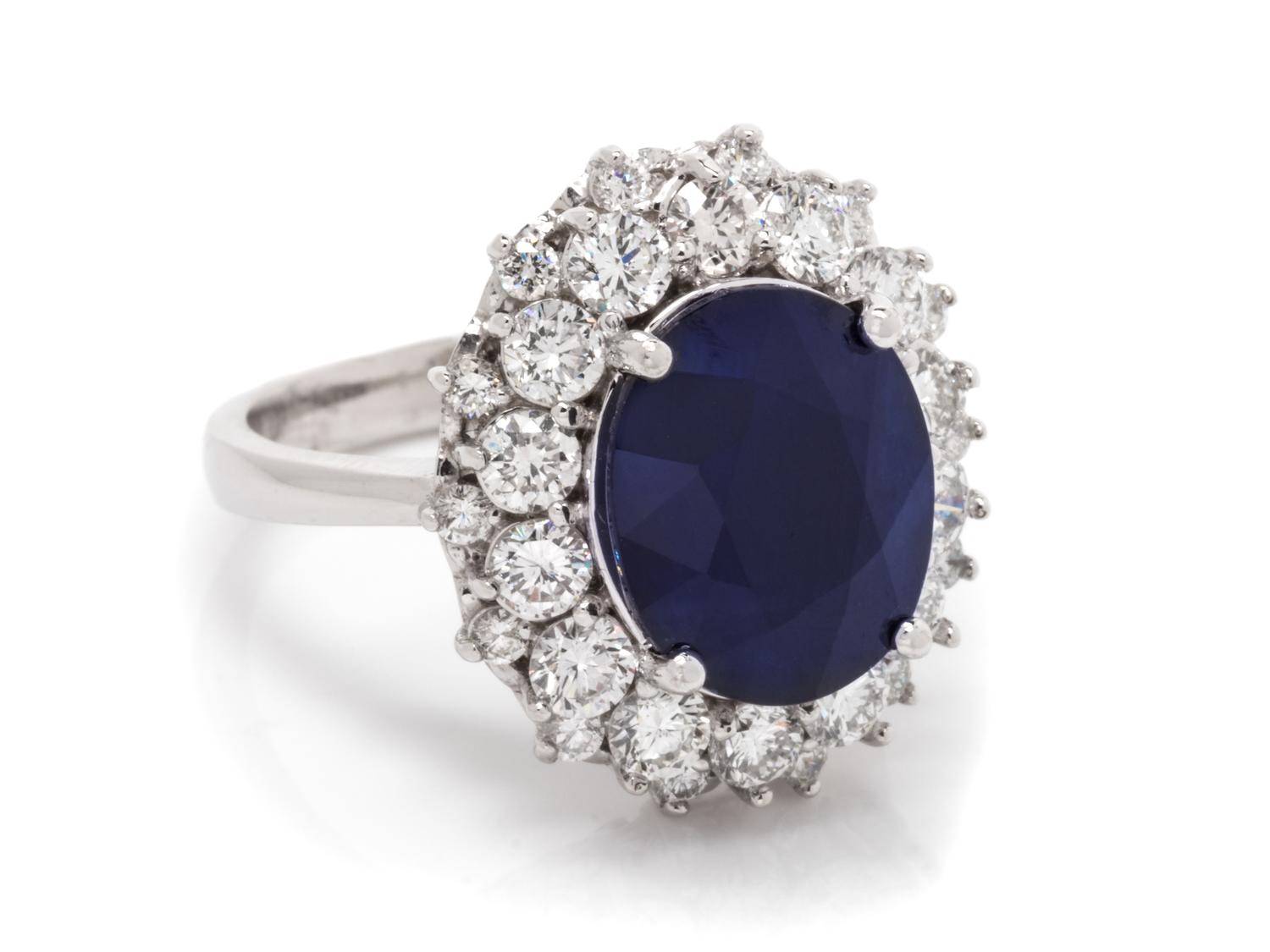 A 14 Karat White Gold, Sapphire and Diamond Ring,
