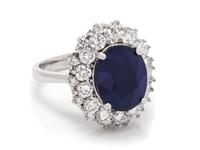 A 14 Karat White Gold, Sapphire and Diamond Ring,