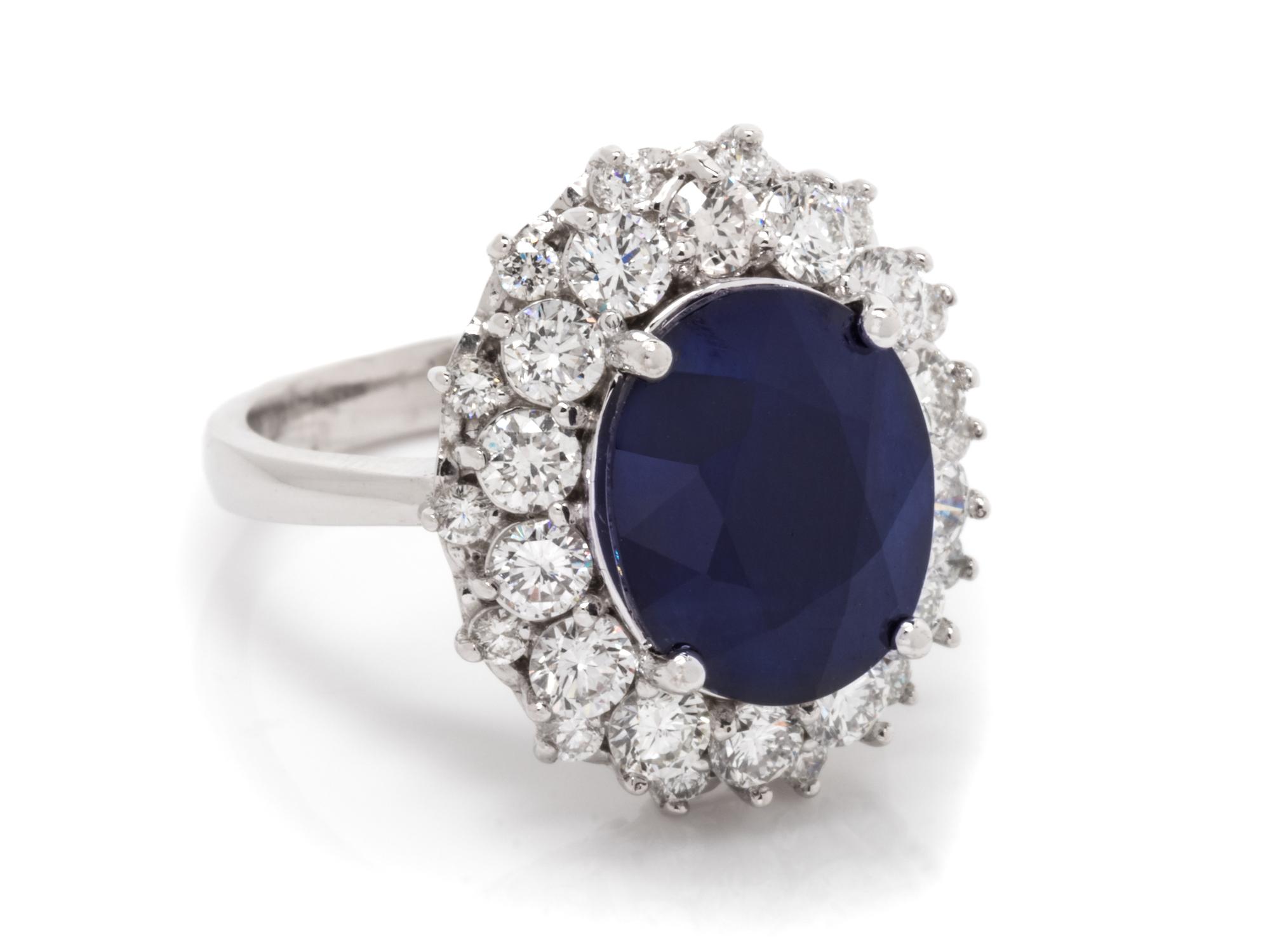 A 14 Karat White Gold, Sapphire and Diamond Ring,