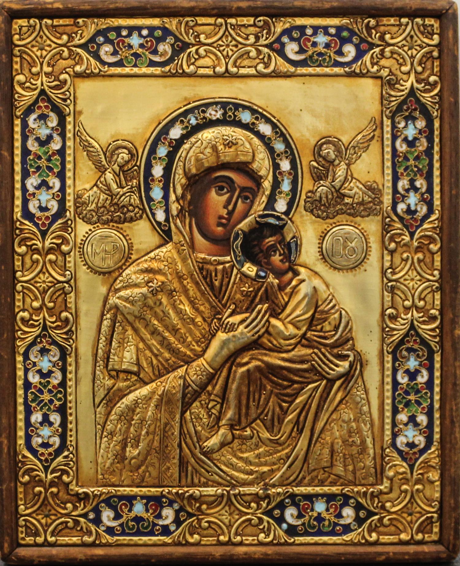 An Eastern European Enameled Oklad Icon. Height 9 3/4 x width 8 inches.