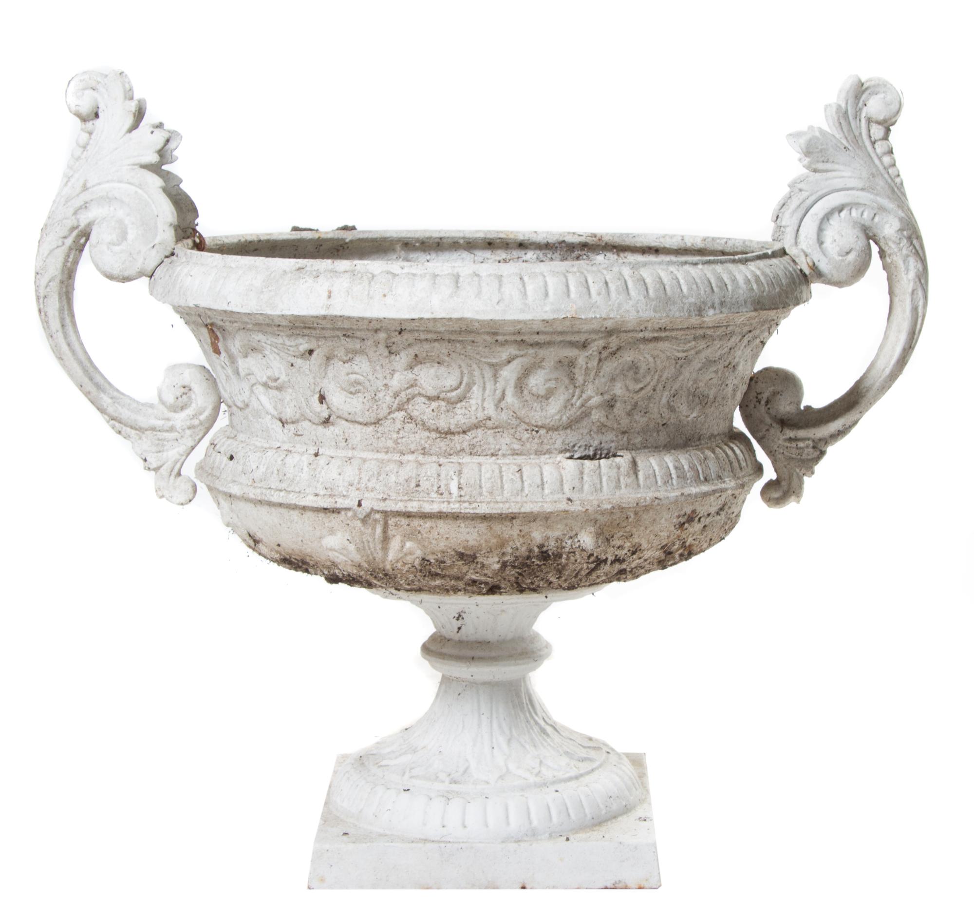A Set of Three Victorian Painted Iron Jardinieres Width 28 1/2 inches.