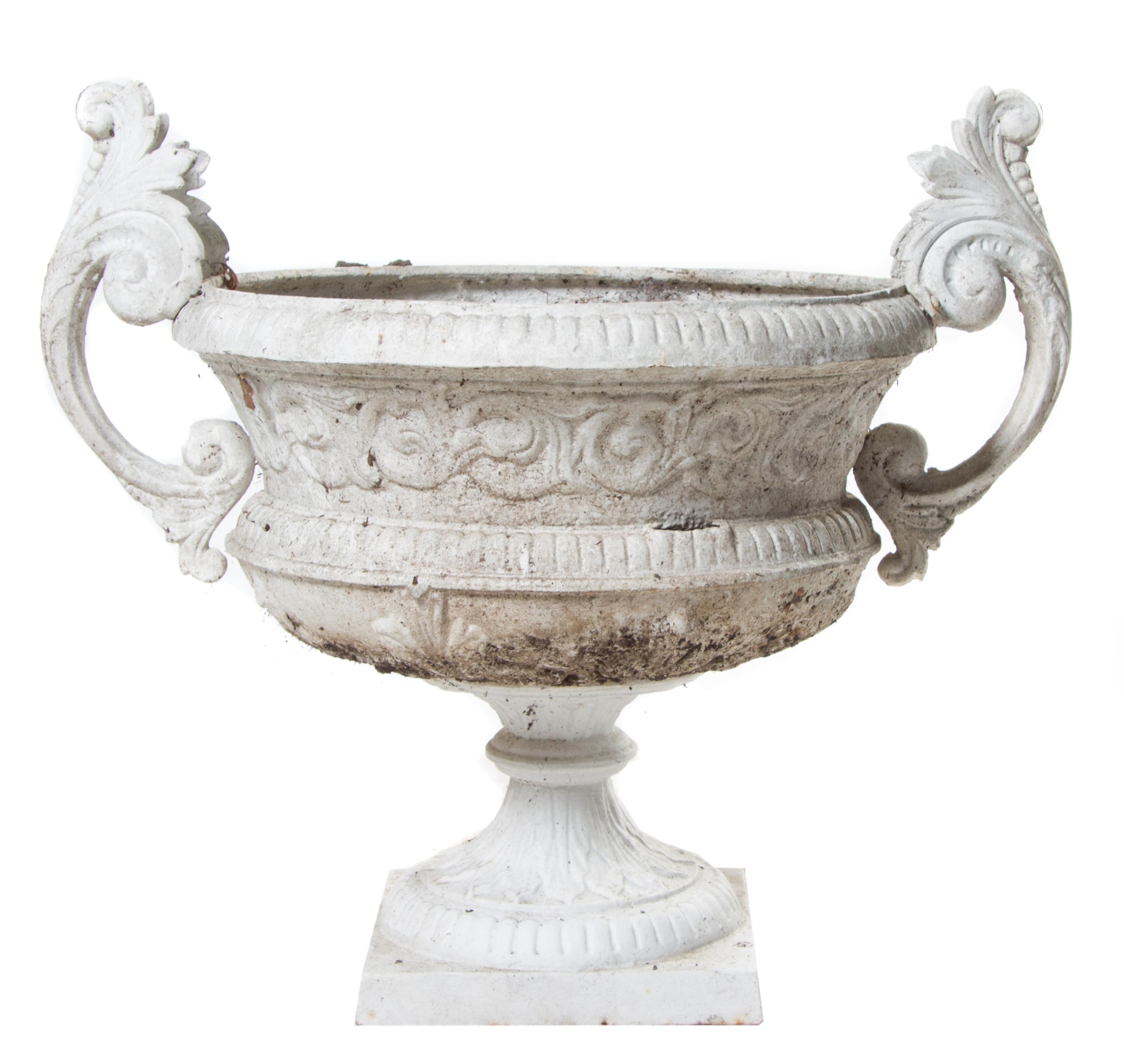 A Set of Three Victorian Painted Iron Jardinieres Width 28 1/2 inches.