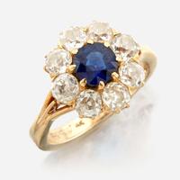 A sapphire, diamond, and gold ring