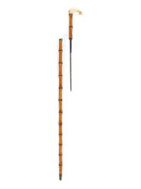 A Group of Folk Art Carved Canes