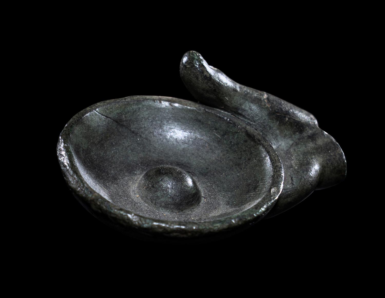 A Greek Bronze Hand of a Satyr Holding a Phiale