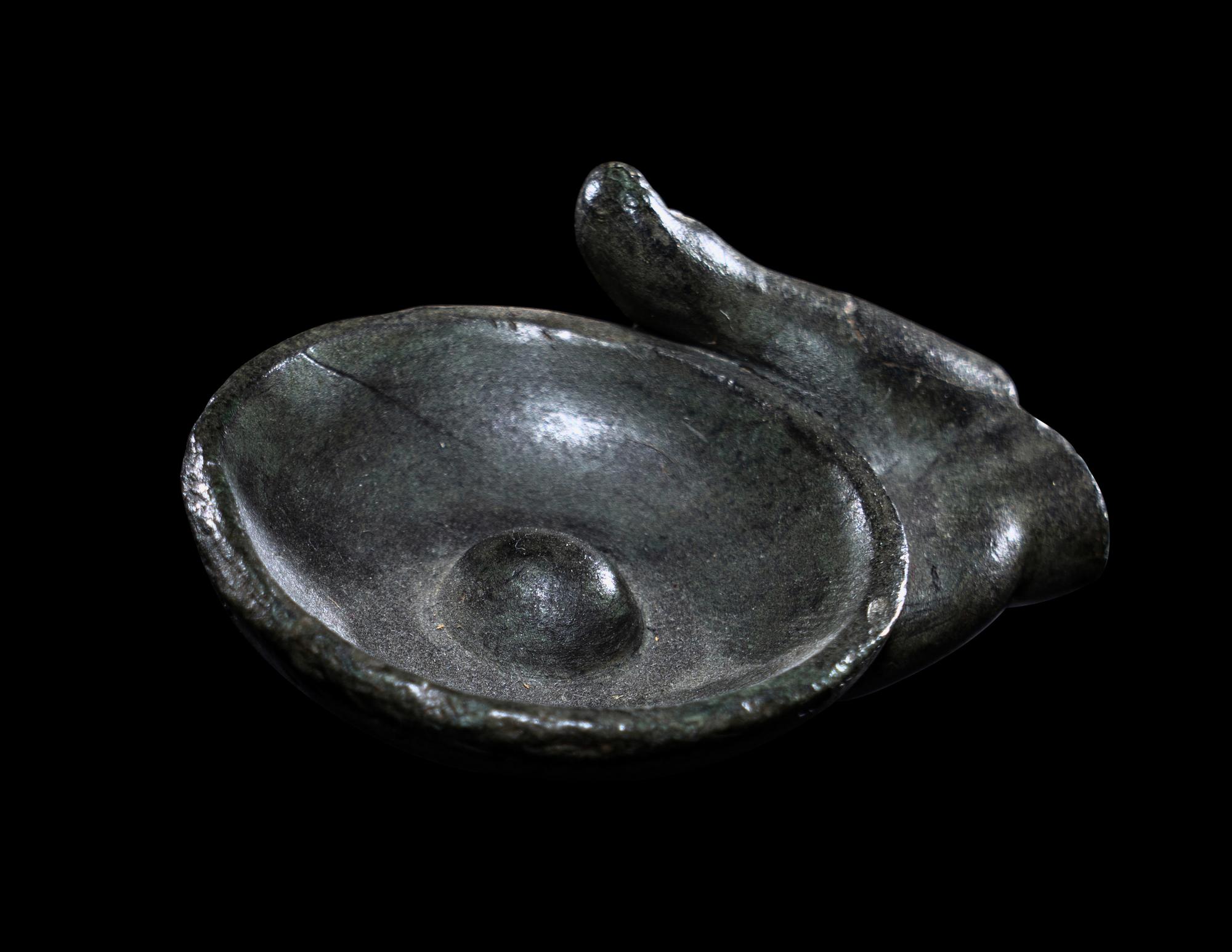 A Greek Bronze Hand of a Satyr Holding a Phiale