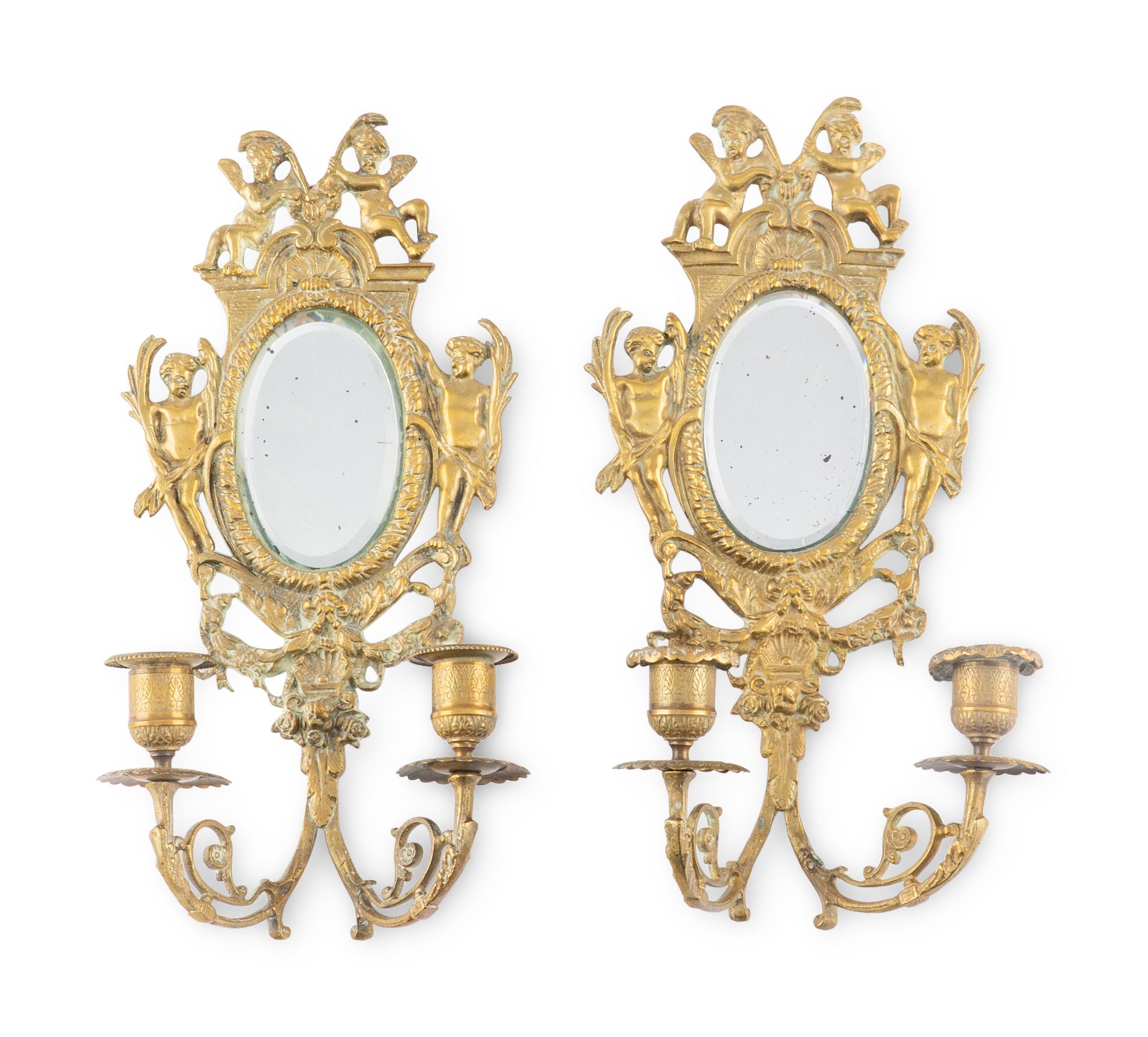 A Pair Of French Brass And Mirror-Inset Two-Light Sconces