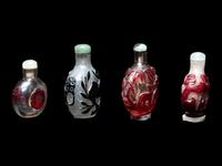 Four Chinese Overlay Glass Snuff Bottles