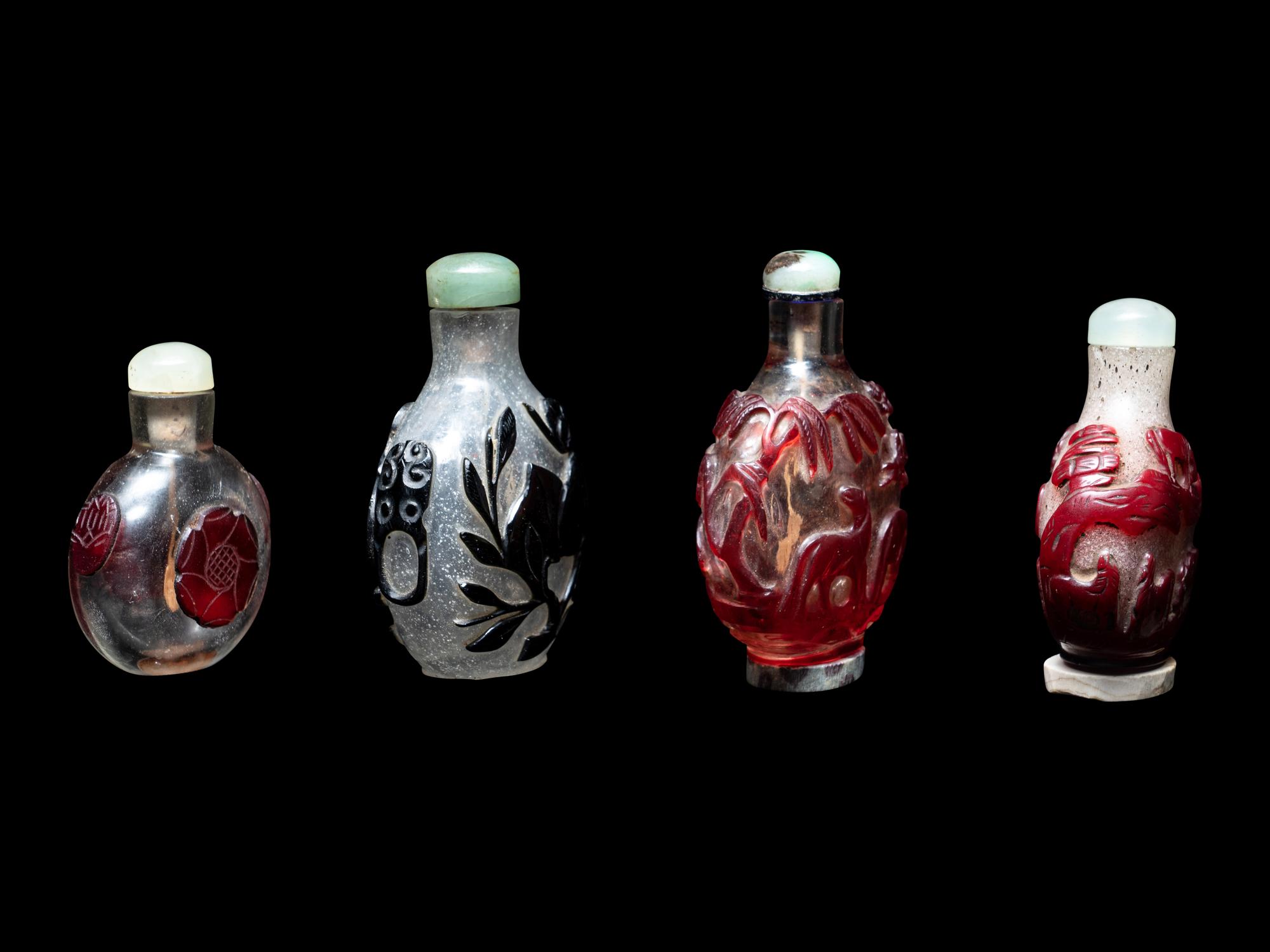 Four Chinese Overlay Glass Snuff Bottles