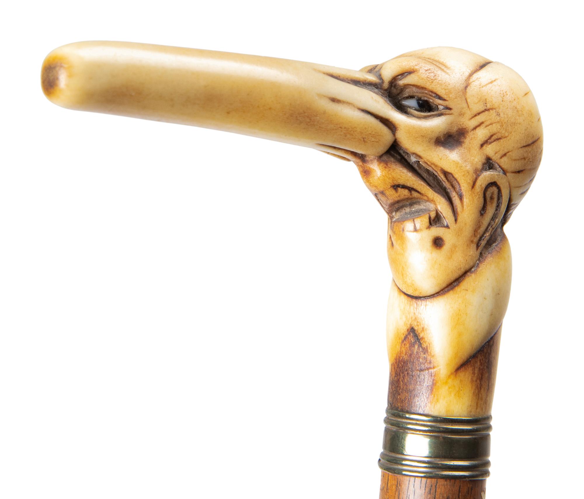 Three Carved Horn or Bone and Brass-Mounted Figural Canes