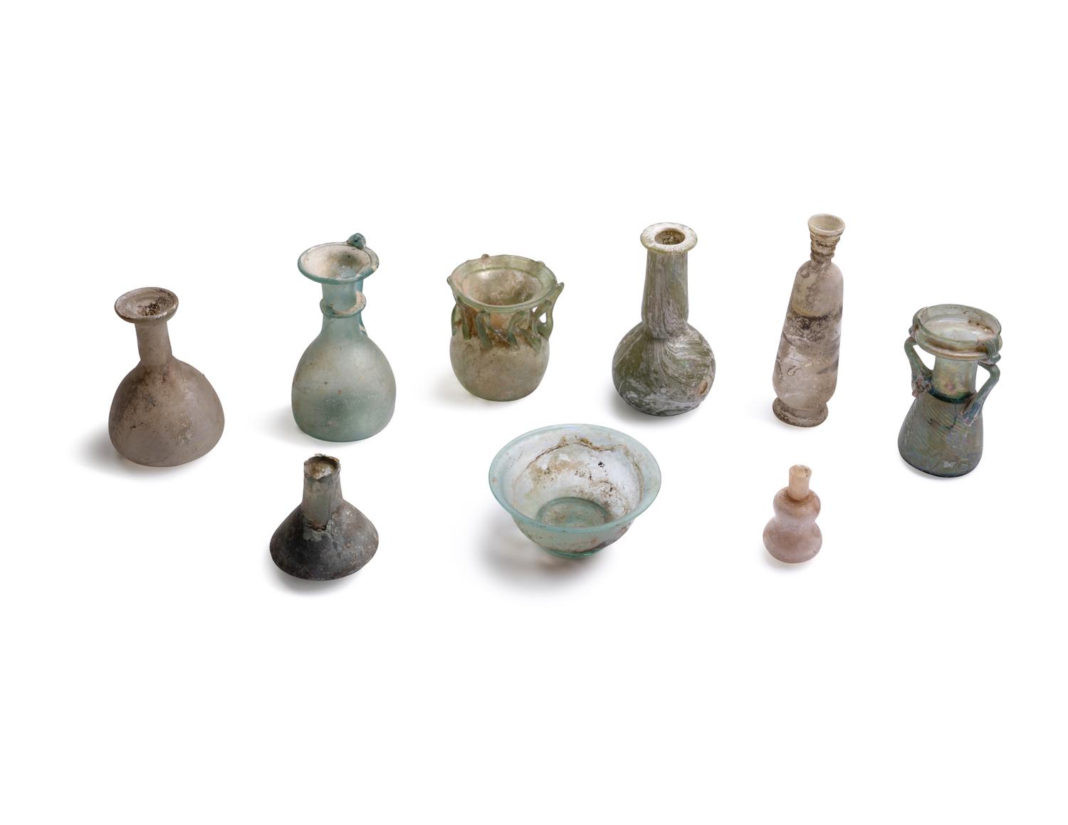 A Group of 8 Roman Glass Vessels
