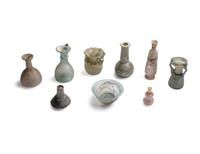 A Group of 8 Roman Glass Vessels